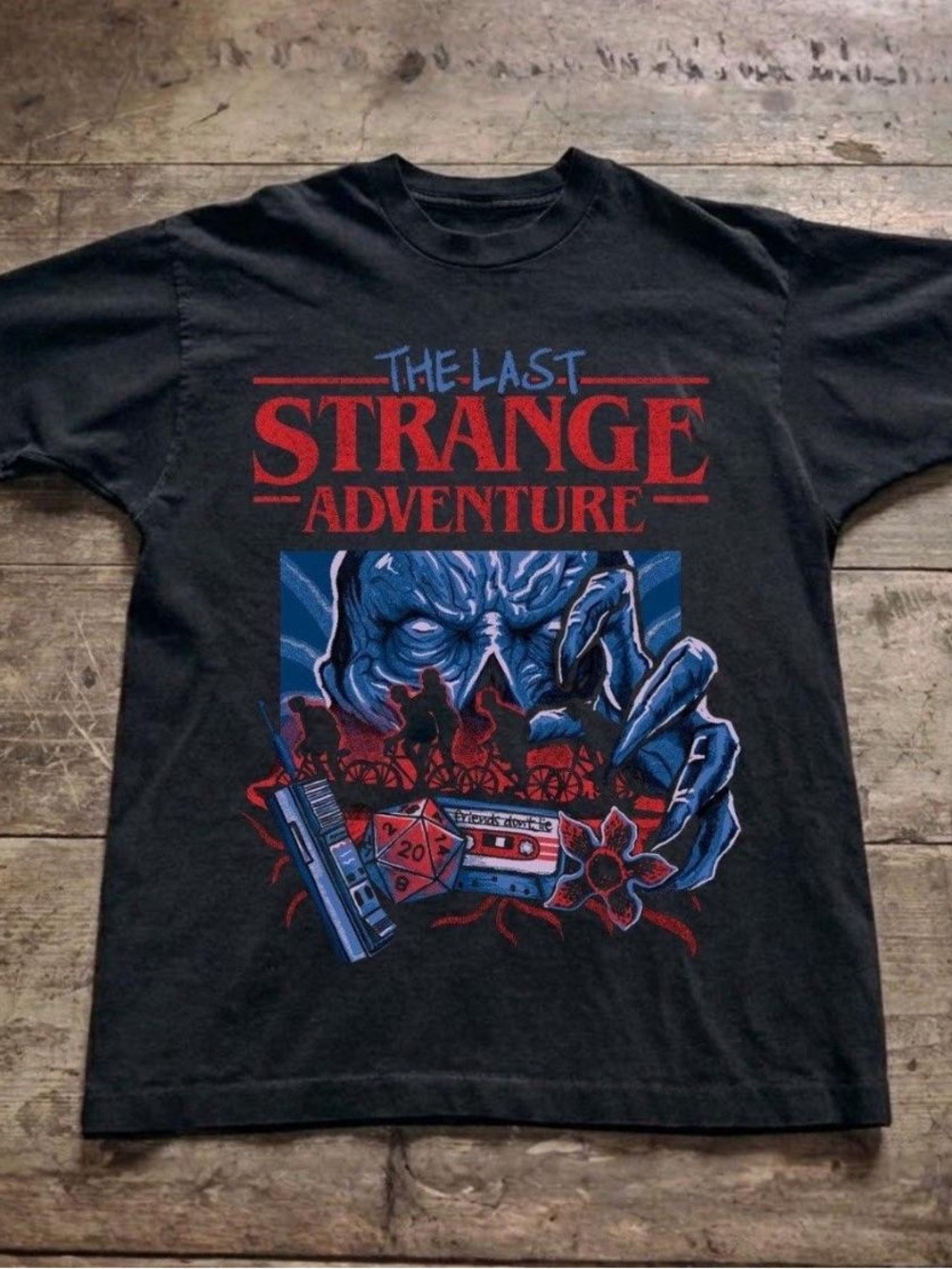 Gildan Black Tee with Red and Blue 'The Last Strange Adventure' Graphic